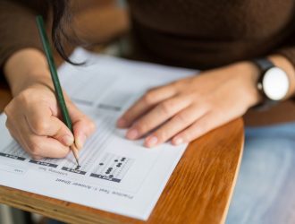 Best ACT Prep Books: Person taking a test