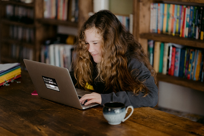 Girl using her dedicated space for distance learning