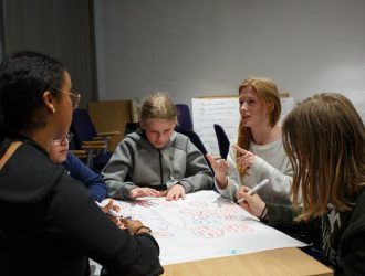 Kids Participating in Debate Preparation